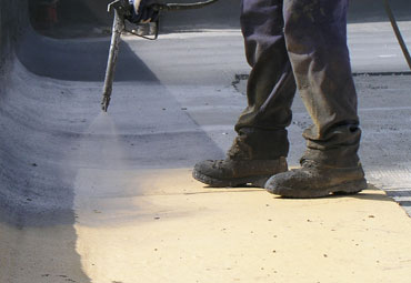 Coating systems over El Paso spray foam roof systems