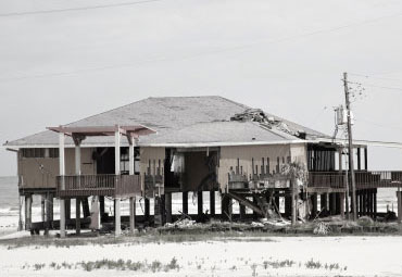 Wind damage - spray foam can help prevent uplift to El Paso roofs